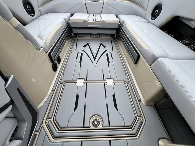 Slide: The Image of Interior of 2024 Supra SL 450 boat with luxurious seating and stylish flooring. - 31