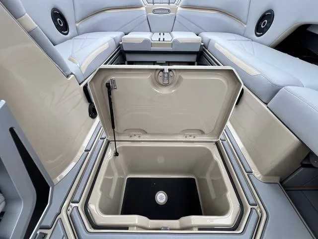 Slide: The Image of 2024 Supra SL 450 boat interior with open storage compartment. - 32