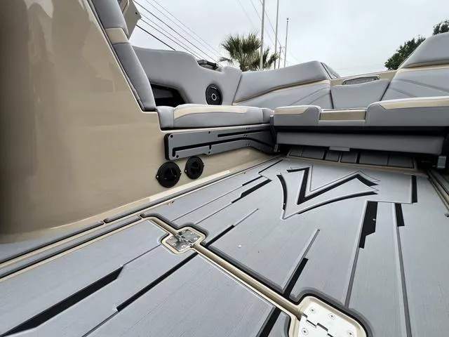Slide: The Image of 2024 Supra SL 450 boat interior with modern seating and deck design. - 33