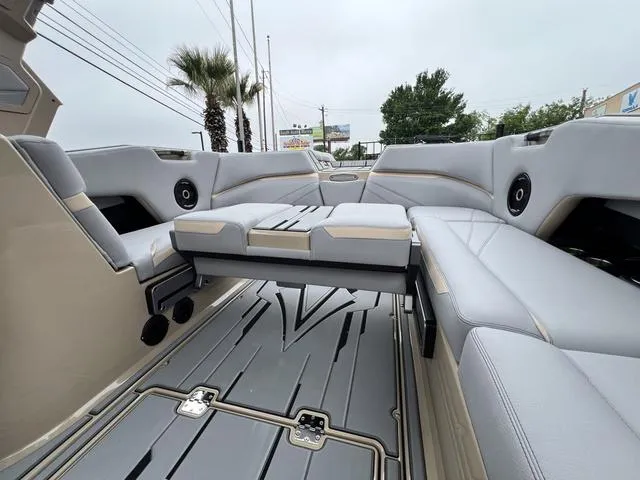 Slide: The Image of 2024 Supra SL 450 boat interior with luxurious seating and modern design. - 37