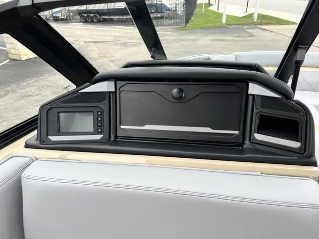 Slide: The Image of 2024 Supra SL 450 boat dashboard with modern controls and sleek design. - 47