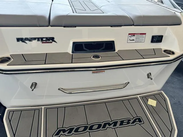 Slide: The Image of 2024 Moomba Max boat rear view with Raptor engine and swim platform. - 3