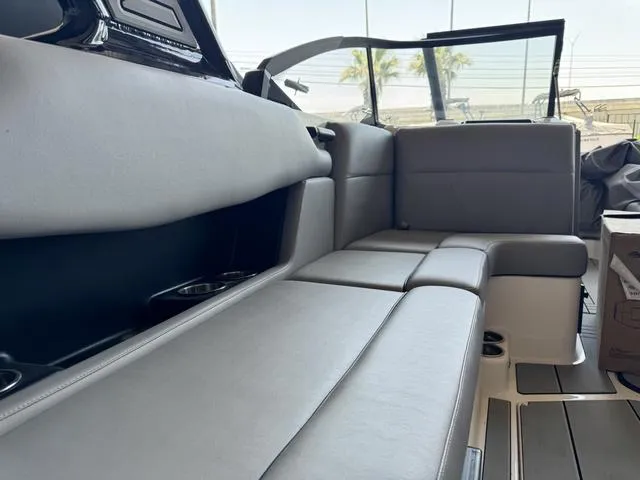 Slide: The Image of 2024 Moomba Max boat interior with spacious seating and modern design. - 8