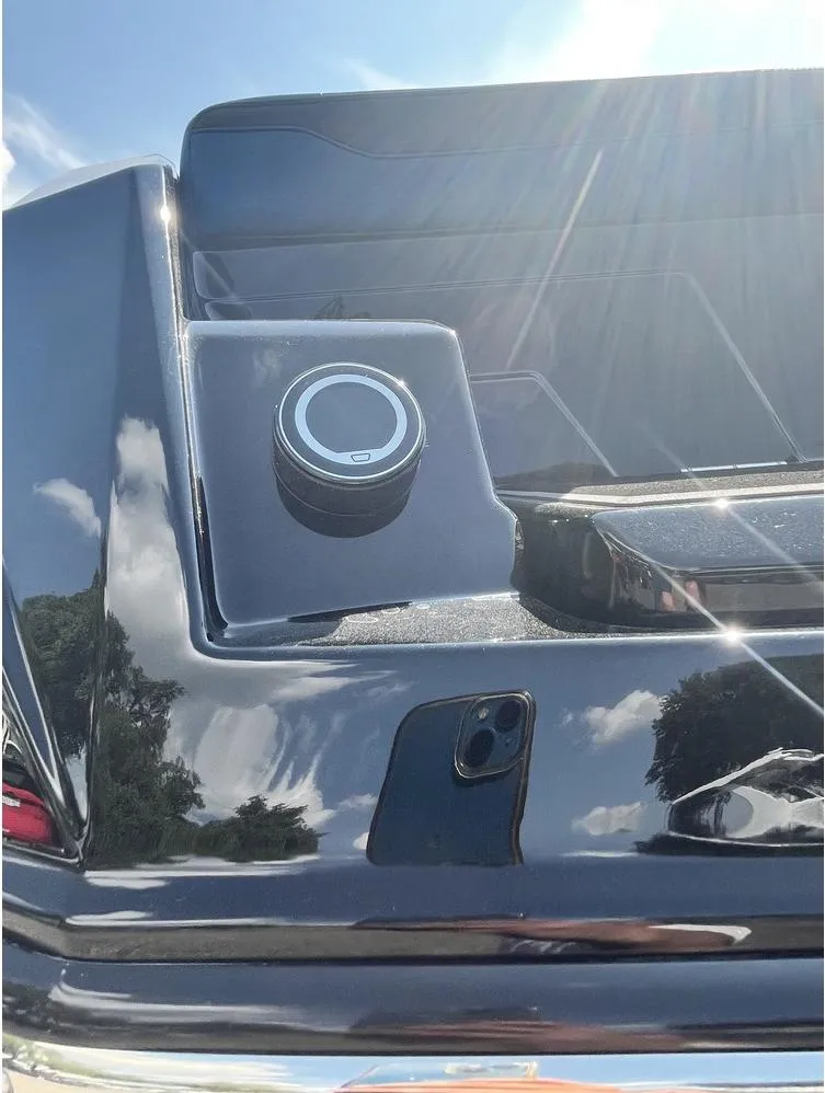 Slide: The Image of 2024 Supra SE 550 rear detail with sleek black finish and sunlight reflections. - 16