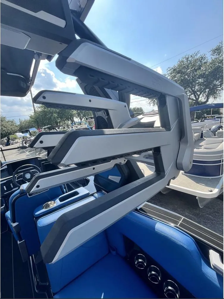 Slide: The Image of 2024 Supra SE 550 boat interior with modern seating and sleek design elements. - 9