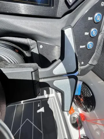 Slide: The Image of Close-up of 2021 Centurion Fi 23 boat steering wheel and control panel. - 15