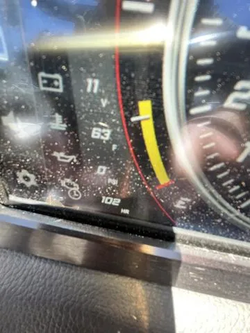 Slide: The Image of Close-up of 2021 Centurion Fi 23 dashboard showing gauges and indicators. - 17