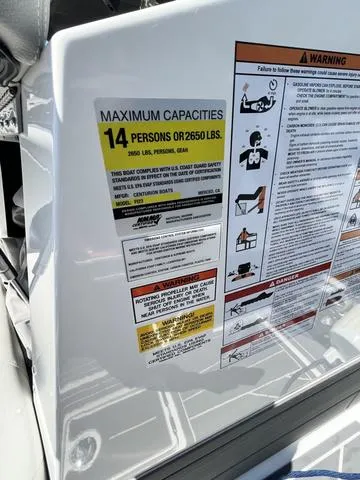 Slide: The Image of 2021 Centurion Fi 23 boat capacity label and safety warnings. - 18