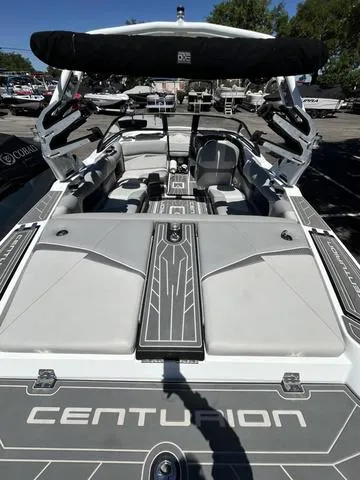Slide: The Image of 2021 Centurion Fi 23 boat interior with seating and storage compartments. - 3
