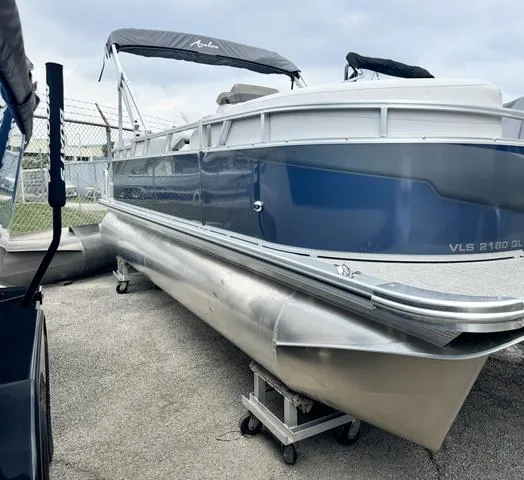 Slide: The Image of 2024 Avalon VLS 21 Quad Lounger pontoon boat on display. - 4
