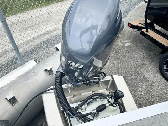 Slide: The Image of 2024 Avalon VLS 21 Quad Lounger with Yamaha 90 outboard motor. - 7