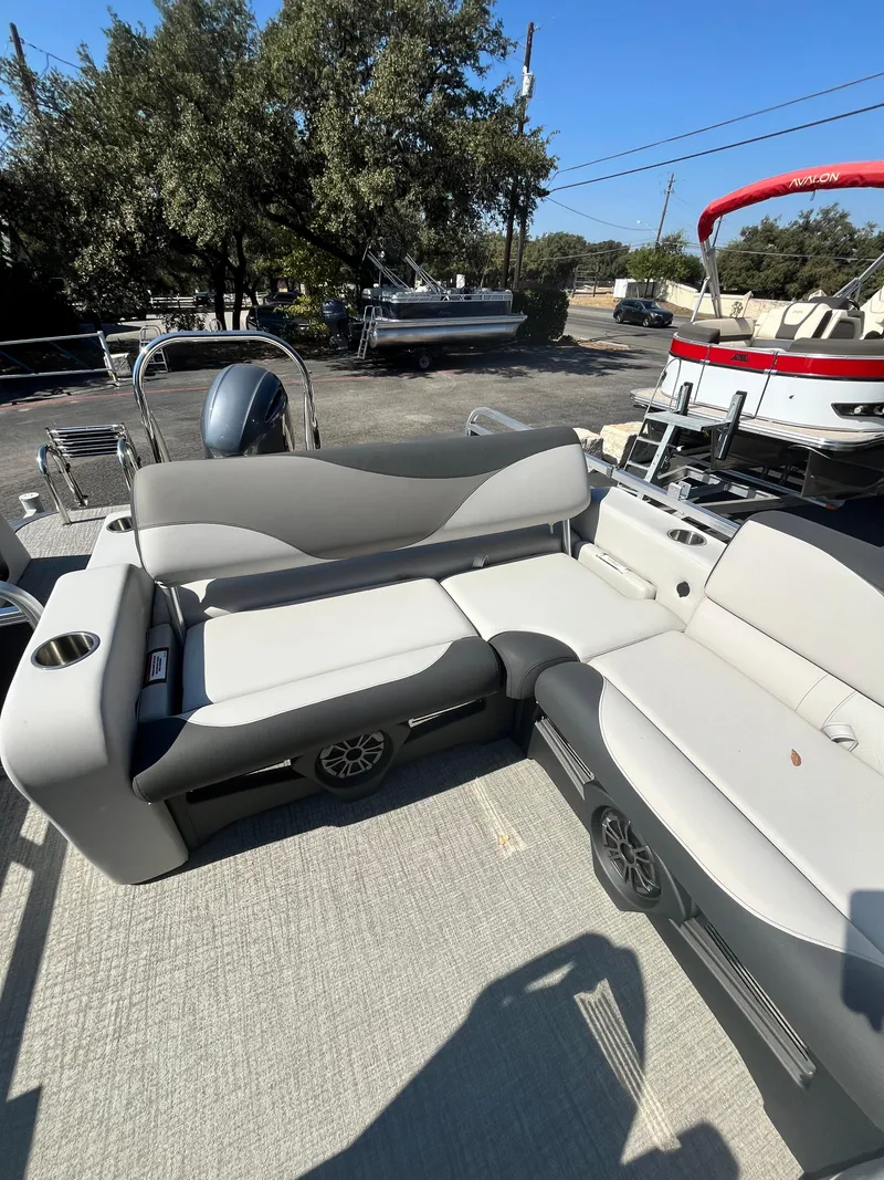 Slide: The Image of 2024 Avalon LSZ Versatile Rear Bench boat with comfortable seating and modern design. - 19