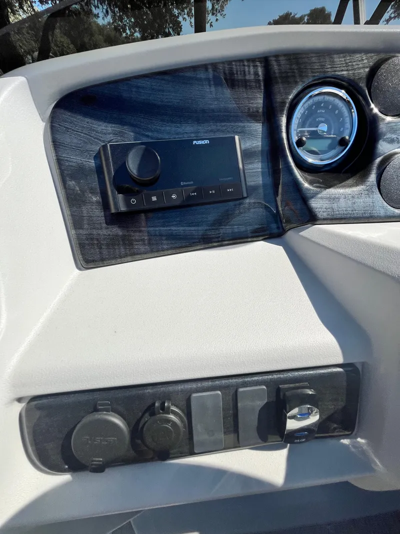 Slide: The Image of 2024 Avalon LSZ Versatile Rear Bench dashboard with controls and gauge. - 6