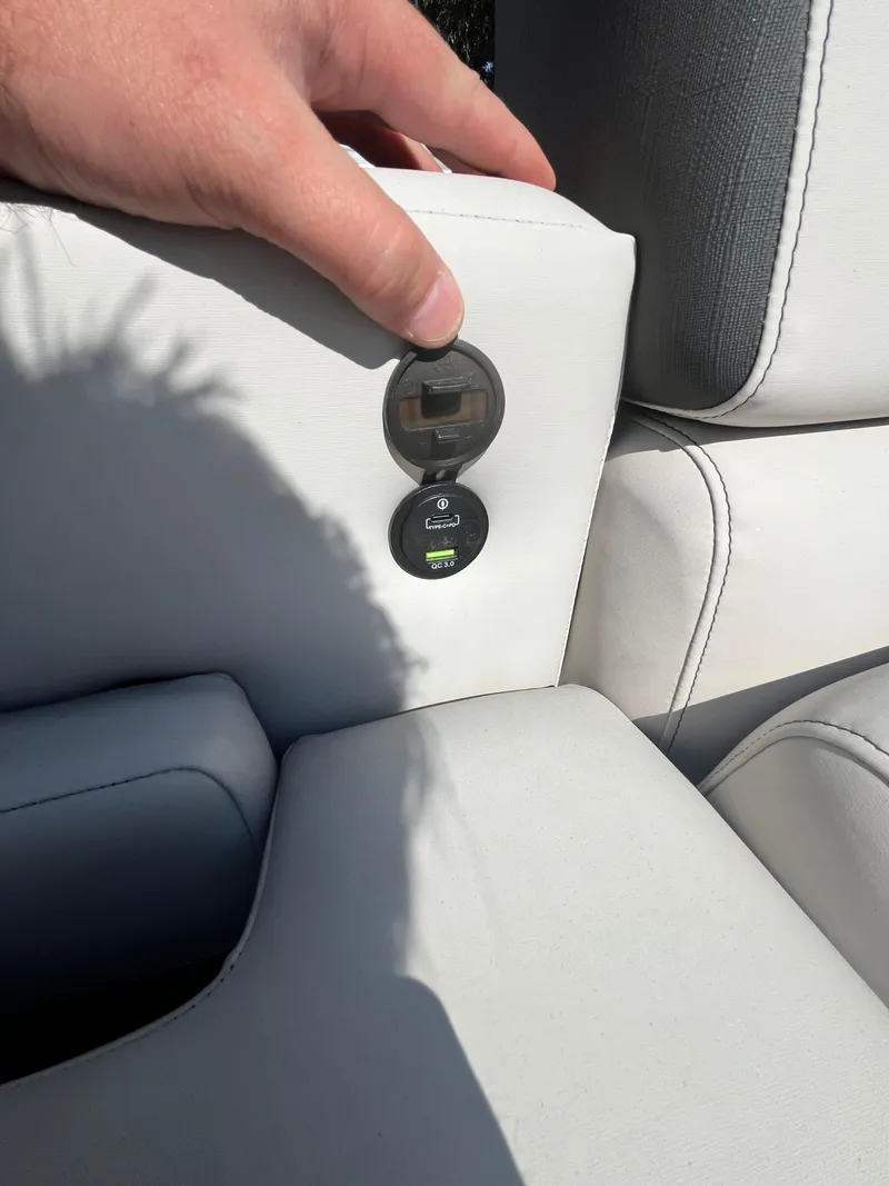 Slide: The Image of 2024 Avalon LSZ Versatile Rear Bench with USB port and hand detail. - 8