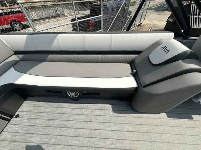 Slide: The Image of 2024 Avalon Catalina 25' Quad Lounger interior seating with gray and white upholstery. - 18