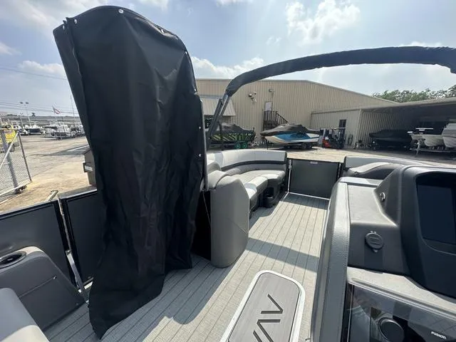 Slide: The Image of 2024 Avalon Catalina 25' Quad Lounger interior view with seating and canopy. - 35