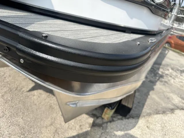 Slide: The Image of Close-up of 2024 Avalon Catalina 25' Quad Lounger boat's stern and deck. - 9