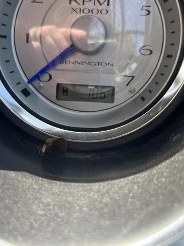 Slide: The Image of Close-up of 2015 Bennington 25 IO QCW boat tachometer. - 10