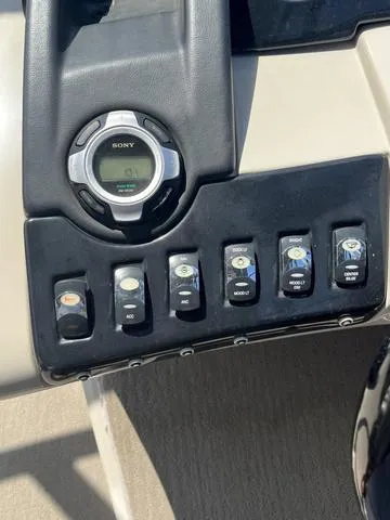 Slide: The Image of Control panel of a 2015 Bennington 25 IO QCW boat with Sony audio system. - 11