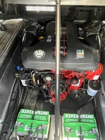 Slide: The Image of 2015 Bennington 25 IO QCW boat engine compartment with Interstate batteries. - 16