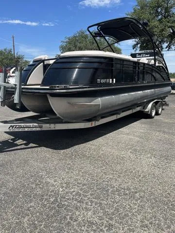 Slide: The Image of 2015 Bennington 25 IO QCW pontoon boat on a trailer. - 17