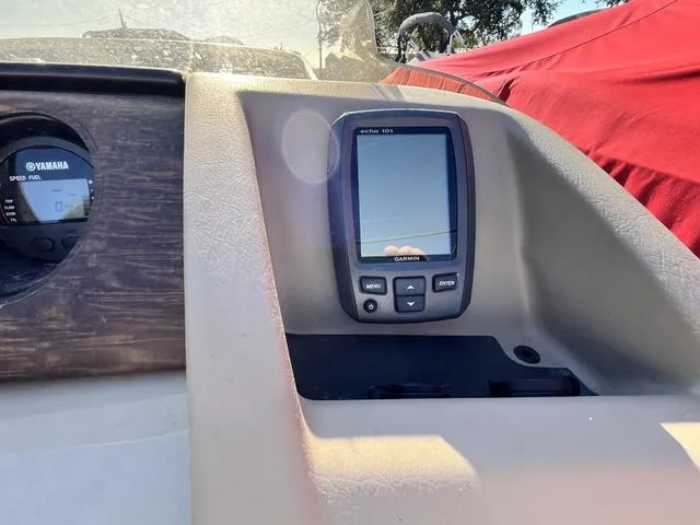 Slide: The Image of 2015 Bennington 2275 RCW dashboard with Garmin Echo 101 and Yamaha speed gauge. - 11