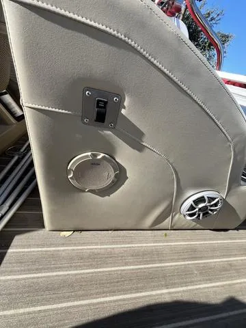 Slide: The Image of 2015 Bennington 2275 RCW boat interior with speaker and switch panel. - 14