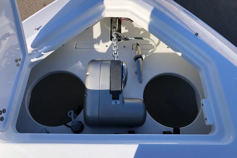 Slide: The Image of Anchor compartment of 2025 Four Winns H9 boat, featuring storage and equipment. - 31