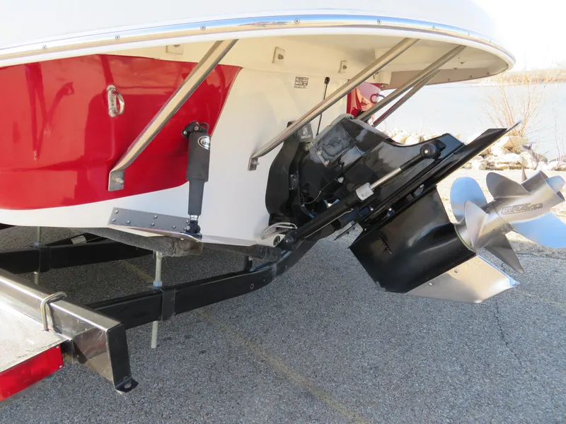 Slide: The Image of 2012 Crownline 275 SS boat stern with outboard motor and propeller. - 3