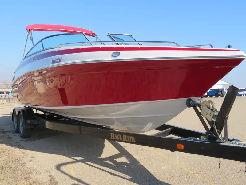 Slide: The Image of 2012 Crownline 275 SS boat on Haul Rite trailer, red and white exterior. - 7