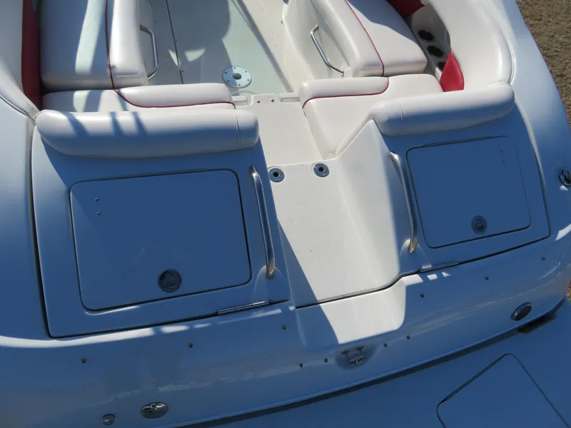 Slide: The Image of 2012 Crownline 275 SS boat rear seating and storage compartments. - 8