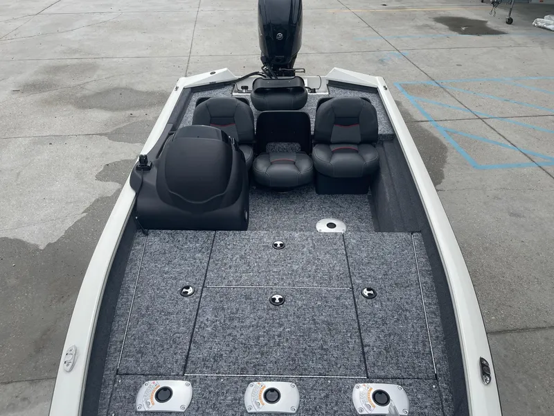Slide: The Image of 2024 Tracker PT175 boat interior with seating and storage compartments. - 10