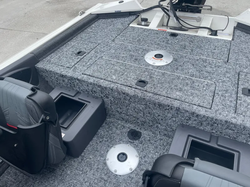 Slide: The Image of 2024 Tracker PT175 boat interior with storage compartments and seating. - 17