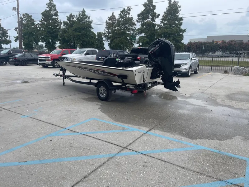 Slide: The Image of 2024 Tracker PT175 boat on trailer in parking lot. - 6