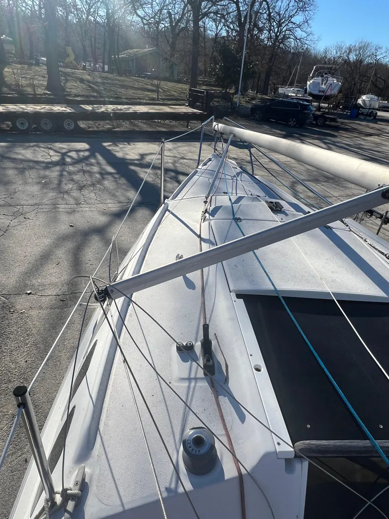 Slide: The Image of 2002 Hunter 240 sailboat deck view with rigging and mast. - 11