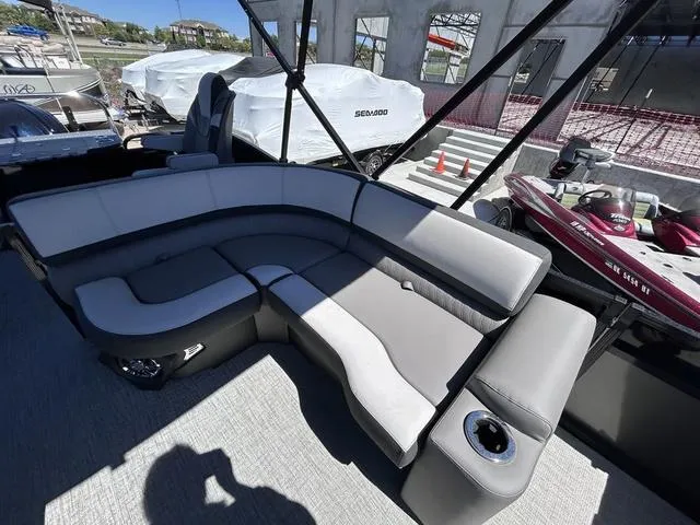 Slide: The Image of 2024 Avalon Catalina Rear Fish 23 FT boat with spacious seating and modern design. - 11