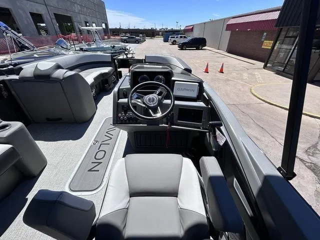 Slide: The Image of 2024 Avalon Catalina Rear Fish 23 FT boat interior with Garmin navigation system. - 15