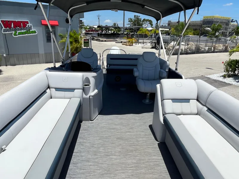 Slide: The Image of 2022 Godfrey SWEETWATER 2486 SFL pontoon boat with spacious seating and canopy. - 18