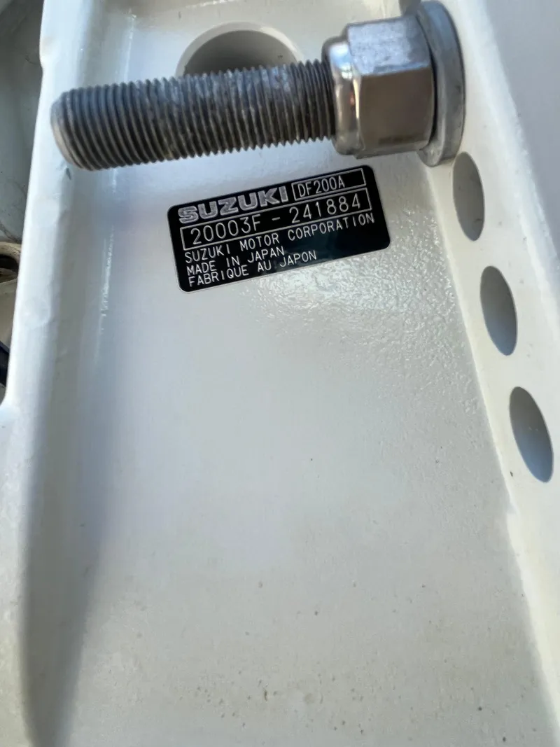 Slide: The Image of Close-up of Suzuki DF200A engine part on 2022 Godfrey SWEETWATER 2486 SFL boat. - 21