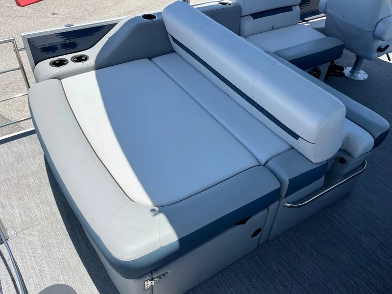 Slide: The Image of 2022 Godfrey SWEETWATER 2486 SFL boat with spacious, cushioned seating area. - 6