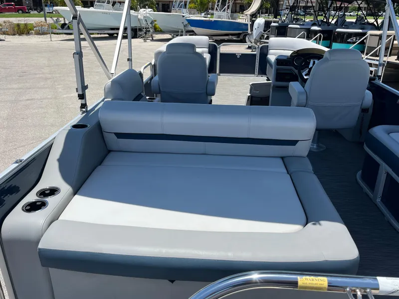 Slide: The Image of 2022 Godfrey SWEETWATER 2486 SFL pontoon boat interior with comfortable seating. - 7