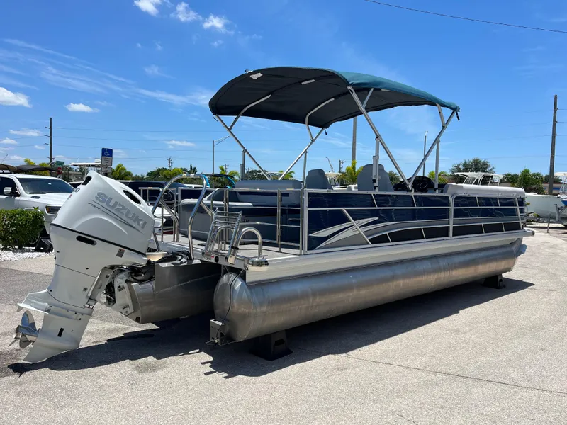 Slide: The Image of 2022 Godfrey SWEETWATER 2486 SFL pontoon boat with Suzuki outboard motor. - 9