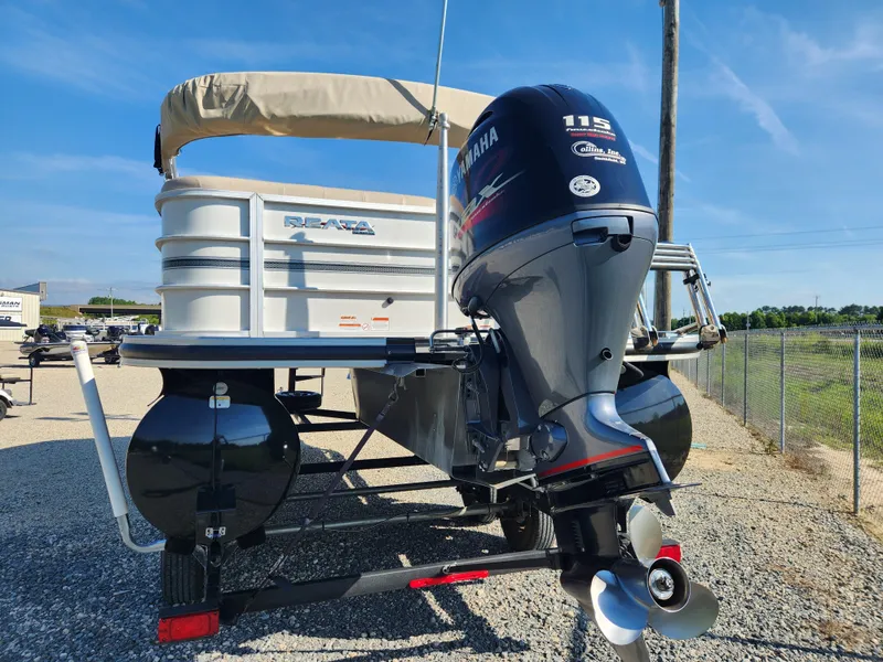 Slide: The Image of 2018 Ranger Reata 220C pontoon boat with Yamaha 115 outboard motor. - 2