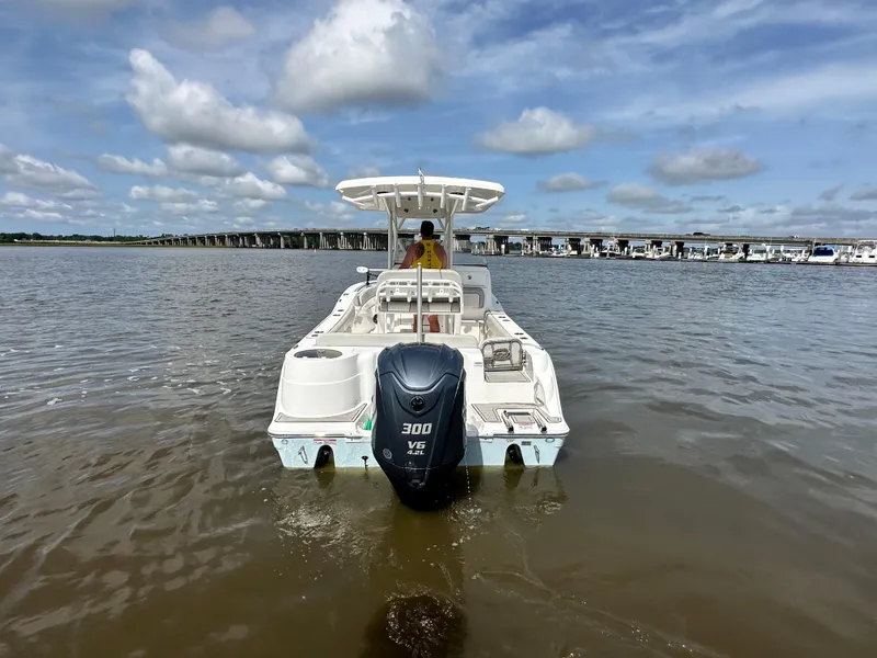 Slide: The Image of 2022 Sea Fox 249 Avenger boat on water with Yamaha 300 outboard motor. - 5