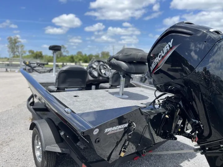 Slide: The Image of 2024 Tracker Pro Team 175 TF fishing boat with Mercury outboard motor. - 5