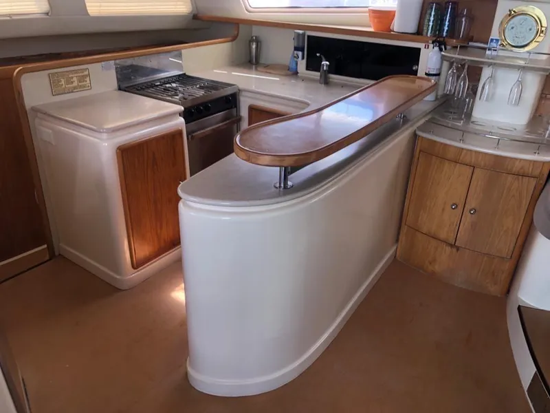 Slide: The Image of Luxurious kitchen interior of 2003 Leopard 47 yacht with modern amenities. - 26