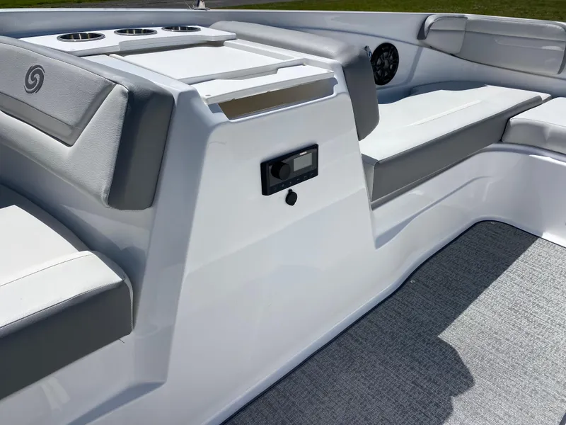 Slide: The Image of 2022 Hurricane SS 205 boat interior with gray seating and modern design. - 12
