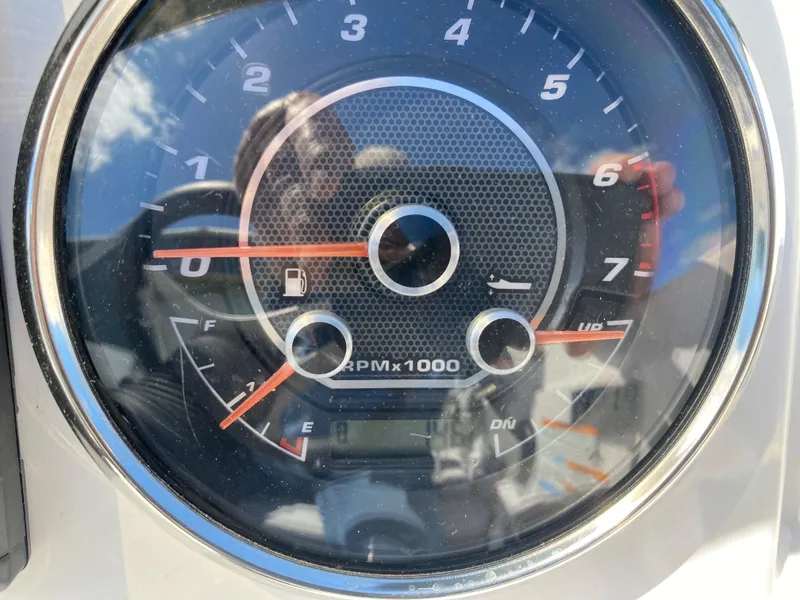 Slide: The Image of Tachometer of 2022 Hurricane SS 205 boat showing RPM and fuel gauge. - 16