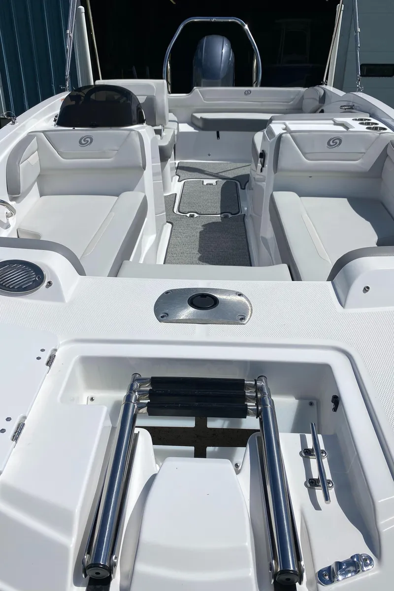 Slide: The Image of 2022 Hurricane SS 205 boat interior with seating and ladder, showcasing modern design. - 6