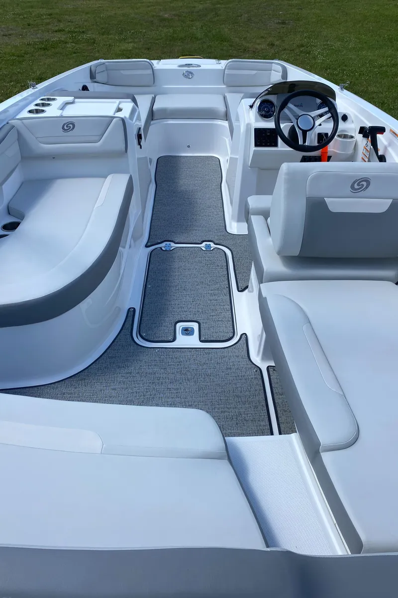 Slide: The Image of 2022 Hurricane SS 205 boat interior with seating and steering wheel. - 7
